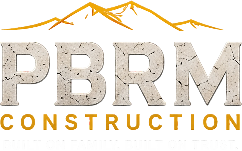 PBRM Construction logo with mountains and tagline